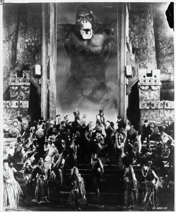 Framed Print : King Kong. Kong the immense prehistoric ape attacks group of men who are Framed Print : King Kong. Kong the immense prehistoric ape attacks group of men who are