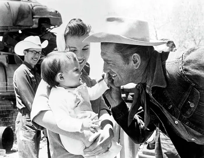 Framed Print : Kirk Douglas with Infant Framed Print : Kirk Douglas with Infant