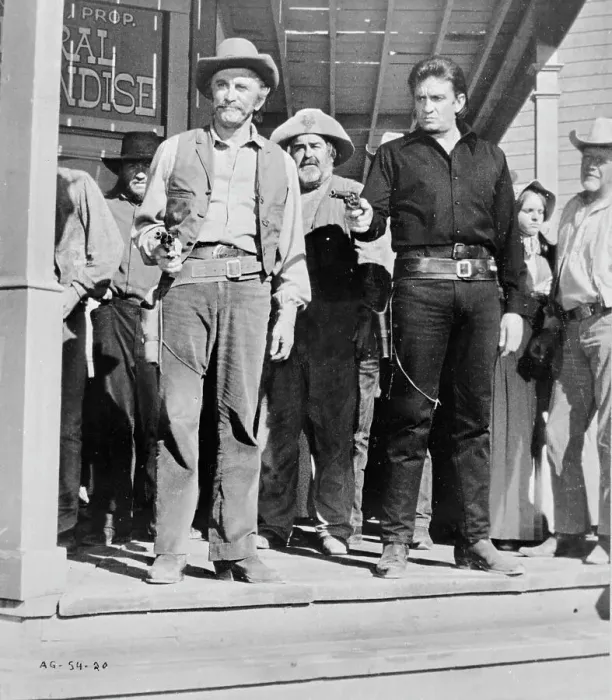 Framed Print : Kirk Douglas and Johnny Cash in Western Movie Scene