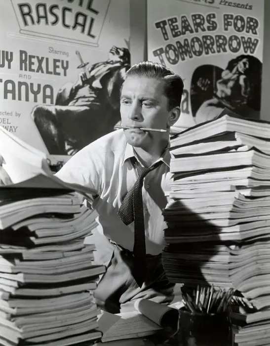 Framed Print : Kirk Douglas Struggles Piles Of Scripts Framed Print : Kirk Douglas Struggles Piles Of Scripts