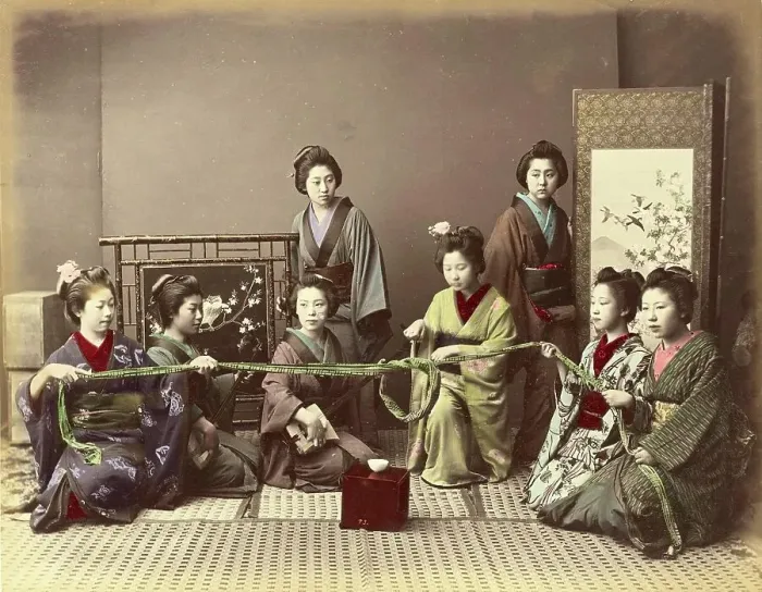 Framed Print : Konkonchiki, Japanese woman at a parlour game, a group of eight young woman, four of whom are holding a rope and playing a game while the others watch, c. 1870, Japan, Historic, digitally restored reproduction from an original of the period