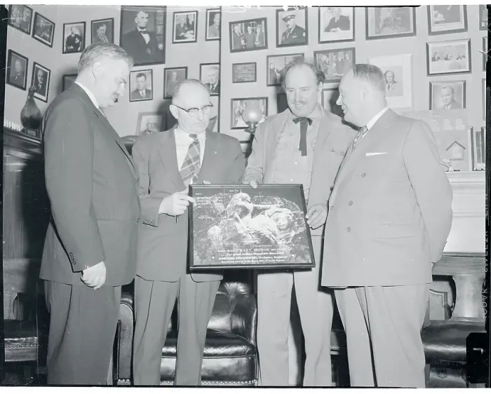 Framed Print : Korczak Ziolkowski Showing Photograph to Colleagues Framed Print : Korczak Ziolkowski Showing Photograph to Colleagues