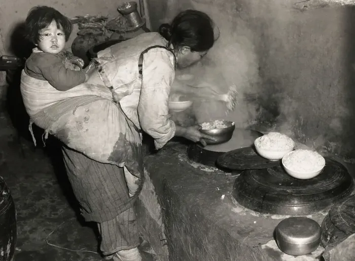 Framed Print : Korean Mother Cooking Framed Print : Korean Mother Cooking