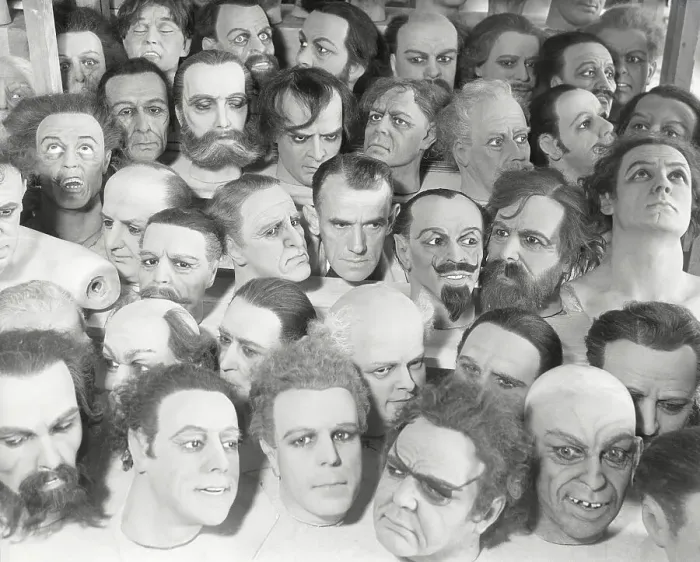 Framed Print : L. E. Cates Surrounded by Wax Heads