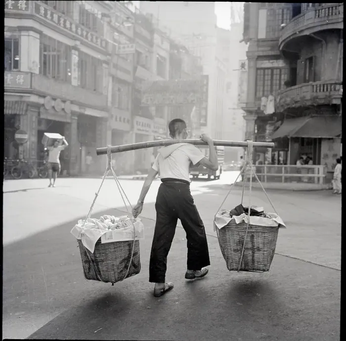 Framed Print : Laborer Carrying Baskets Framed Print : Laborer Carrying Baskets