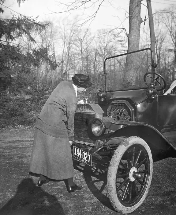 Framed Print : Lady Driver Cranking Her Car 1921 Framed Print : Lady Driver Cranking Her Car 1921