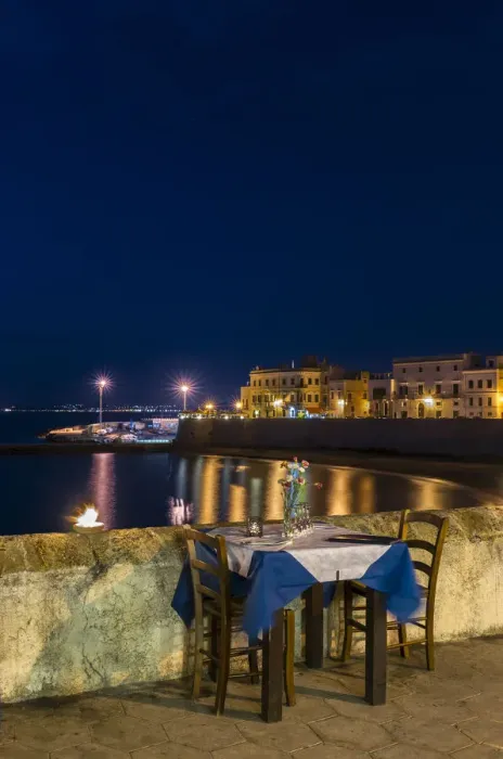 Framed Print : Laid table in restaurant at night, city beach Seno della purita, historic centre, Gallipoli, Province of Lecce, Apulia, Italy Framed Print : Laid table in restaurant at night, city beach Seno della purita, historic centre, Gallipoli, Province of Lecce, Apulia, Italy