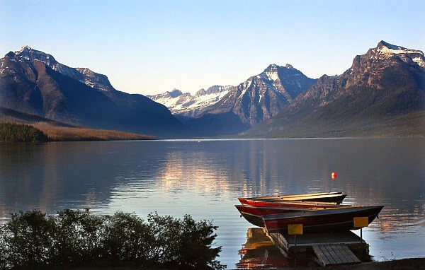 Lake McDonald and mountains, Boats at Glacier National Park, USA