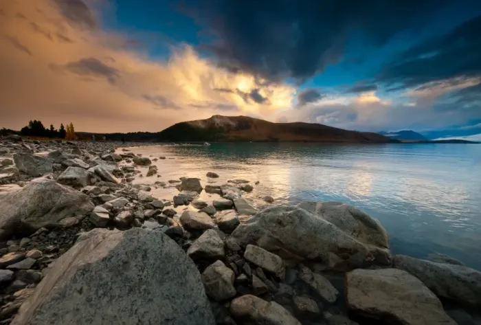 Framed Print : Lake tekapo w  /  rock beach foreground