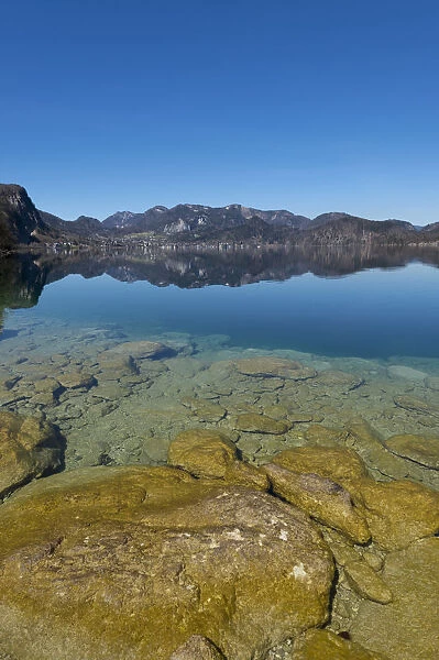 Lake Wolfgang with a reflection of the surrounding mountains, near St. Gilgen, Salzkammergut, Salzburger Land, Oberosterreich, Austria