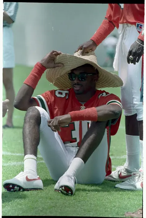 Framed Print : Lamar Thomas Holding Onto Hat Framed Print : Lamar Thomas Holding Onto Hat