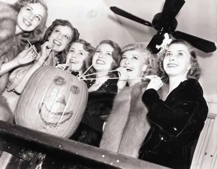 Framed Print : Lana Turner and Friends Drinking from a Pumpkin Framed Print : Lana Turner and Friends Drinking from a Pumpkin