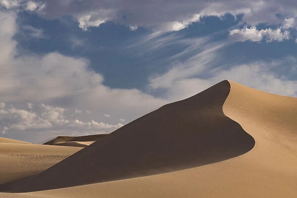 Landscape with sand dunes and clouds, Mojave Trails National Monument, California, USA