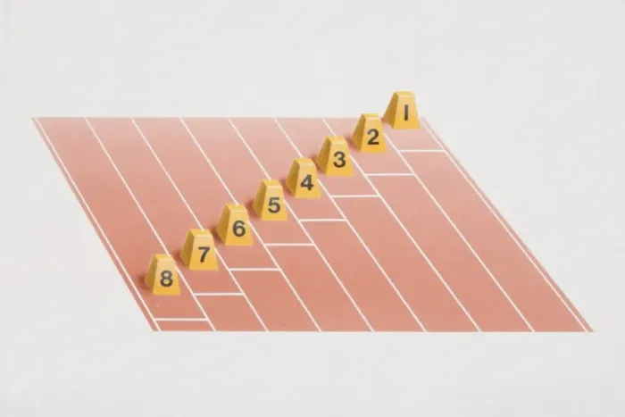 Framed Print : Lane number blocks arranged for staggered start on racing track Framed Print : Lane number blocks arranged for staggered start on racing track