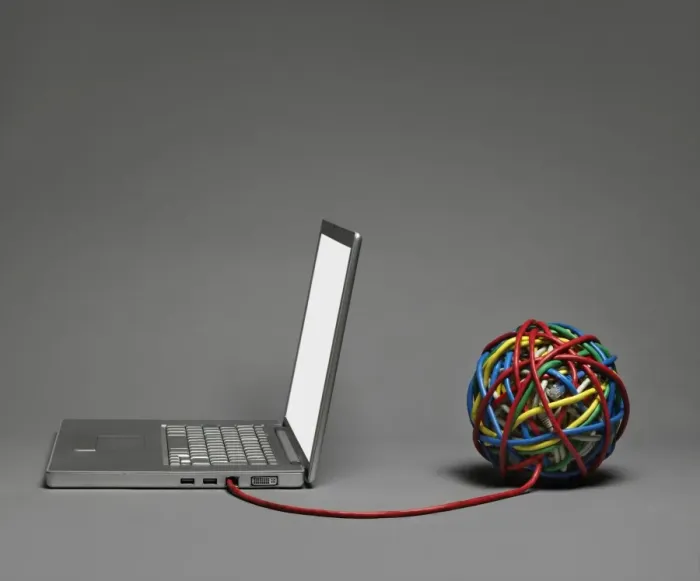 Framed Print : Laptop connected to cable ball Framed Print : Laptop connected to cable ball