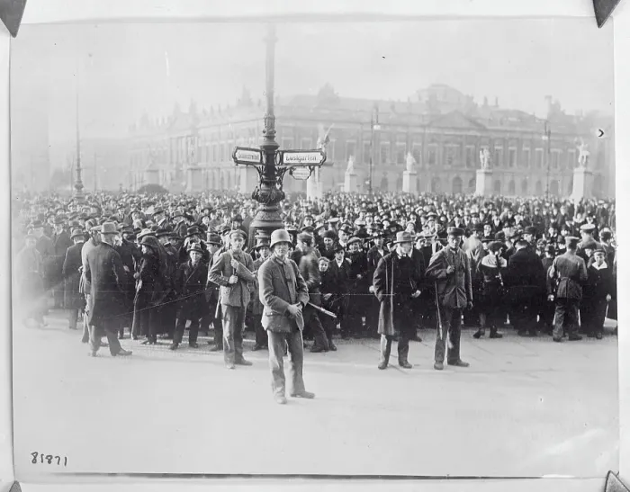 Framed Print : Large Crowd Standing Behind Street Sign