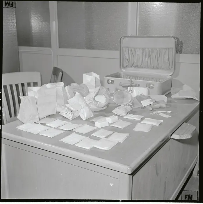 Framed Print : Large Drug Bust Displayed on Desk Framed Print : Large Drug Bust Displayed on Desk
