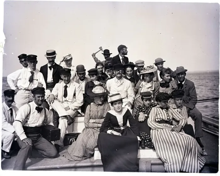 Framed Print : Large Group Of People On Back Of Boat