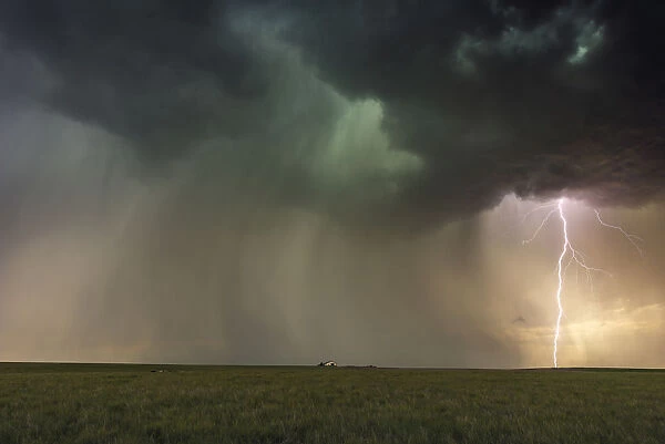 Large Lightning Bolt with a vibrant sky at sunset, Stonham, Colorado. USA