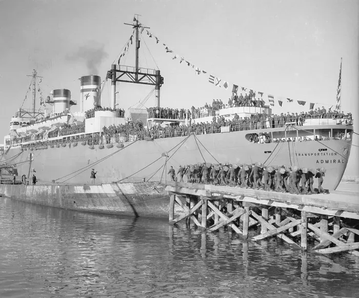 Framed Print : Large Military Ship Near Docks Framed Print : Large Military Ship Near Docks