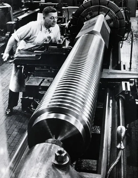 Framed Print : A Very Large Screw Bieng Threaded Framed Print : A Very Large Screw Bieng Threaded