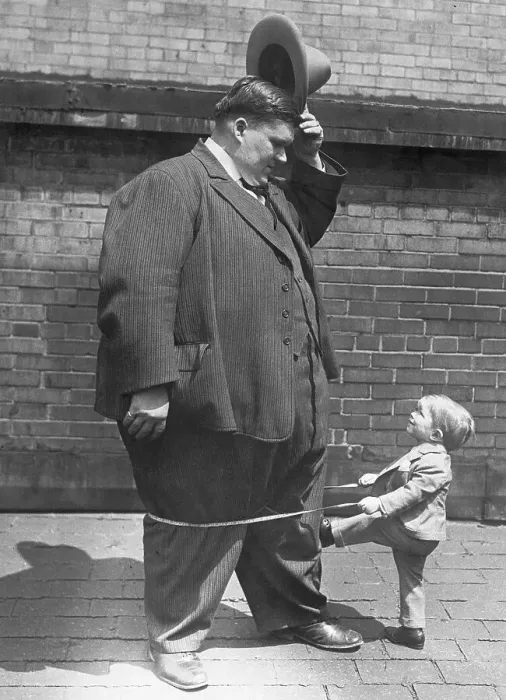 Framed Print : Largest and Smallest Men in World Framed Print : Largest and Smallest Men in World