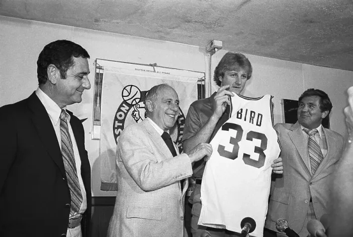 Framed Print : Larry Bird Displaying Team Jersey at a News Conference Framed Print : Larry Bird Displaying Team Jersey at a News Conference