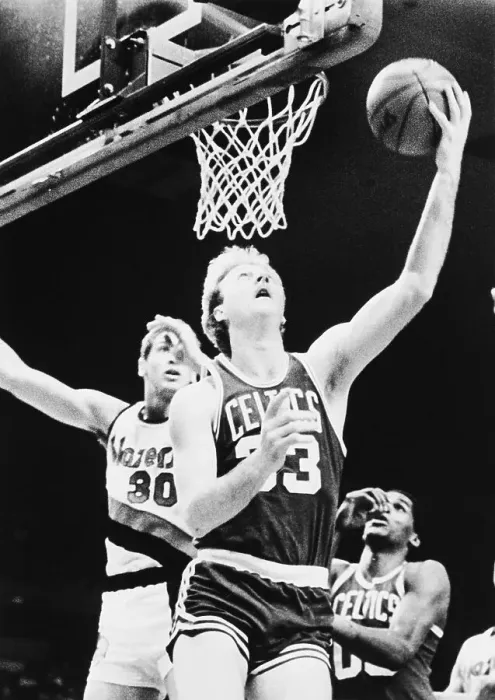 Framed Print : Larry Bird Scores Over Sam Bowie During Basketball Game Framed Print : Larry Bird Scores Over Sam Bowie During Basketball Game
