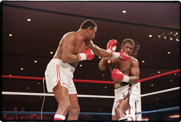 Framed Print : Larry Holmes Punching Michael Spinks Framed Print : Larry Holmes Punching Michael Spinks