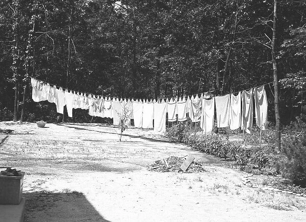 Laundry on a clothesline outdoors, (B&W)