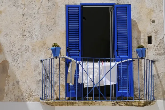 Framed Print : Laundry drying on a balcony, Otranto, Province of Lecce, Apulia, Italy Framed Print : Laundry drying on a balcony, Otranto, Province of Lecce, Apulia, Italy