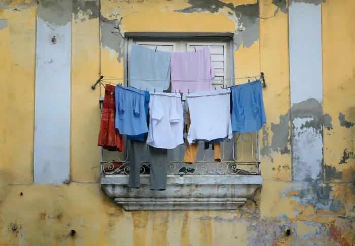 Framed Print : Laundry drying outside window Framed Print : Laundry drying outside window