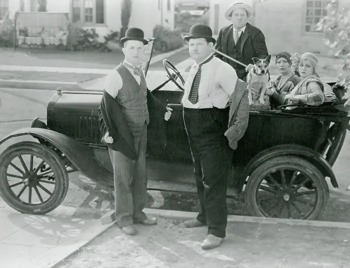 Framed Print : Laurel and Hardy Standing by Car Framed Print : Laurel and Hardy Standing by Car