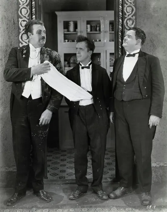 Framed Print : Laurel & Hardy W / Pie-(?)-Splattered Man Framed Print : Laurel & Hardy W / Pie-(?)-Splattered Man