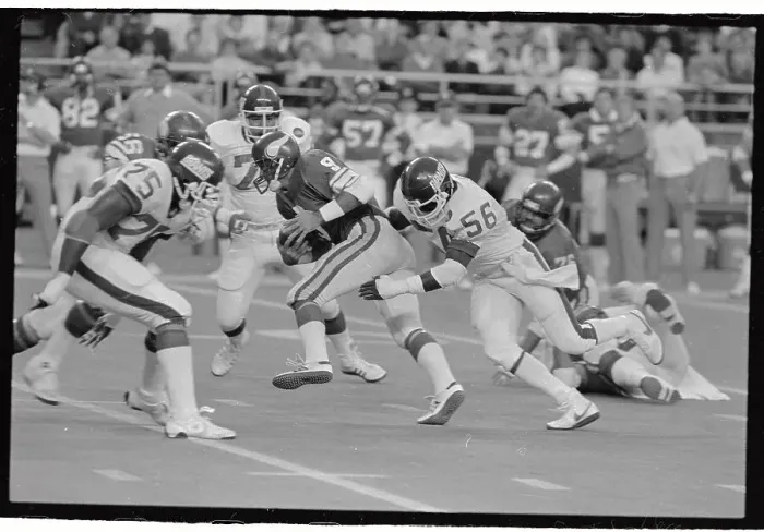 Framed Print : Lawrence Taylor Stopping Tommy Krammer During Football Game