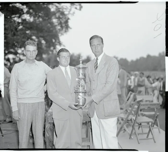 Framed Print : Lawson Little Receiving Trophy