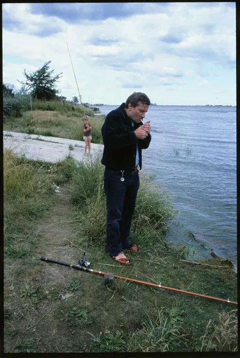 Framed Print : Lech Walesa Fishing and Smoking