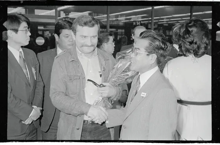 Framed Print : Lech Walesa and Motofumi Kakieda Shaking Hands