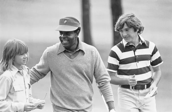 Framed Print : Lee Elder Conversing with Two Youngsters