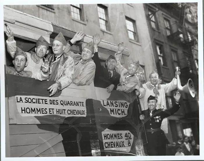 Framed Print : Legionnaires Waving from Parade Float Framed Print : Legionnaires Waving from Parade Float