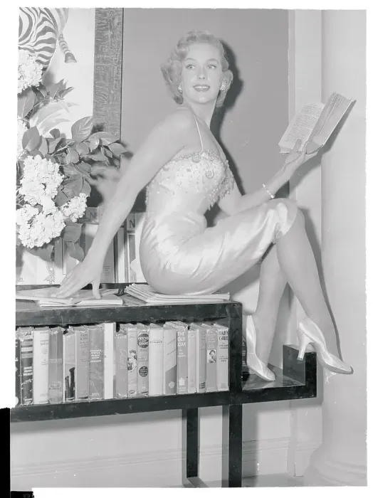 : Leigh Snowden Sitting with Book : Leigh Snowden Sitting with Book