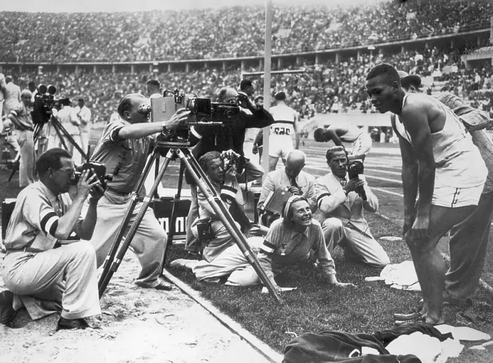 Framed Print : Leni Riefenstahl Filming Archie Williams Framed Print : Leni Riefenstahl Filming Archie Williams
