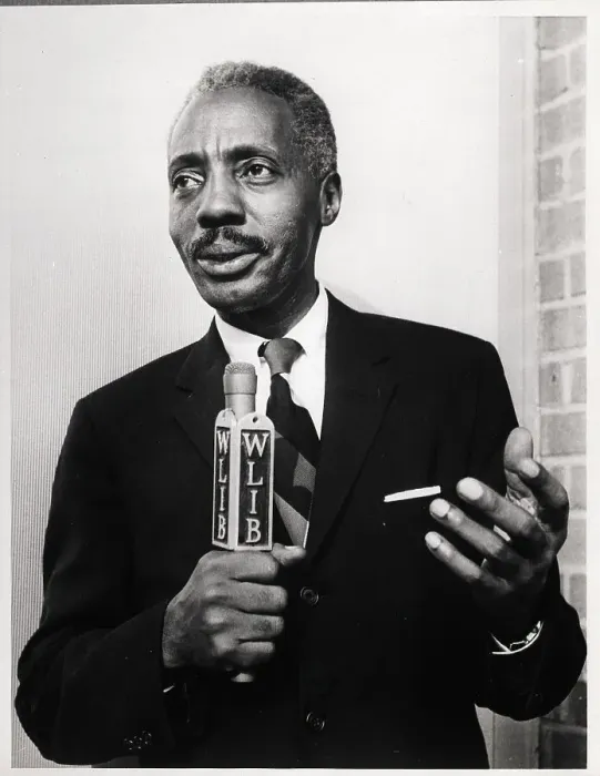 Framed Print : Leon Lewis Holding WLIB Microphone
