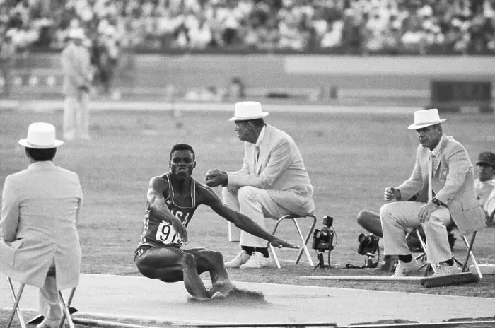 Framed Print : Lewis In The Long Jump At Olympics Framed Print : Lewis In The Long Jump At Olympics
