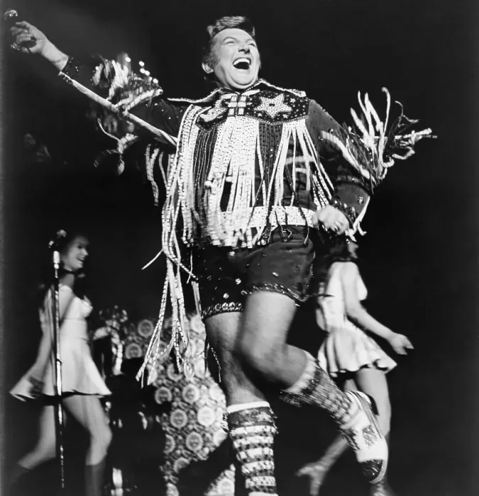 Framed Print : Liberace. Chortling to his opening night audience at Caesar's Palace in Las Vegas Framed Print : Liberace. Chortling to his opening night audience at Caesar's Palace in Las Vegas