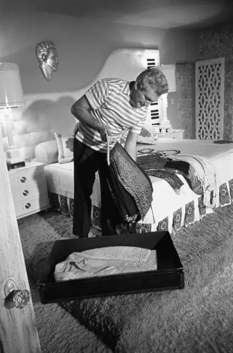 Framed Print : Liberace packing for his tour. He was ready to leave as soon as the photo shoot was over Framed Print : Liberace packing for his tour. He was ready to leave as soon as the photo shoot was over