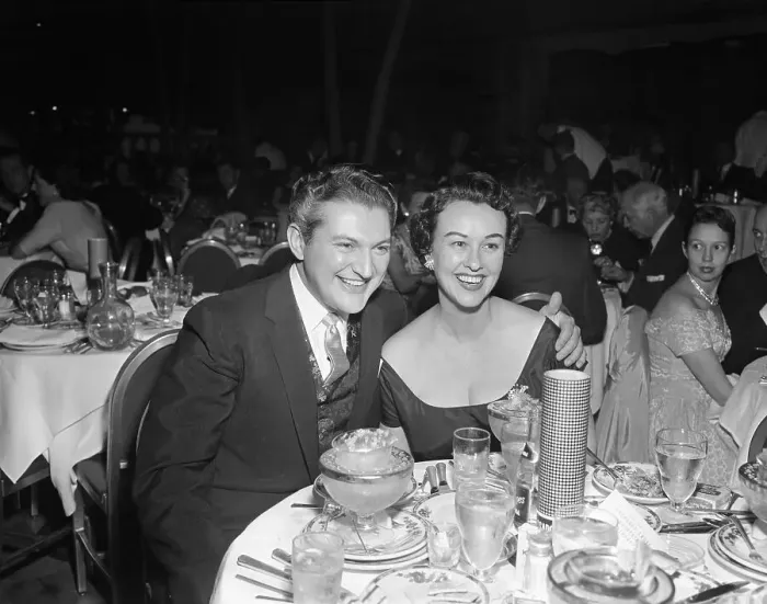 Framed Print : Liberace. Pianist Liberace and Actress Margaret Lindsay enjoy an evening Framed Print : Liberace. Pianist Liberace and Actress Margaret Lindsay enjoy an evening