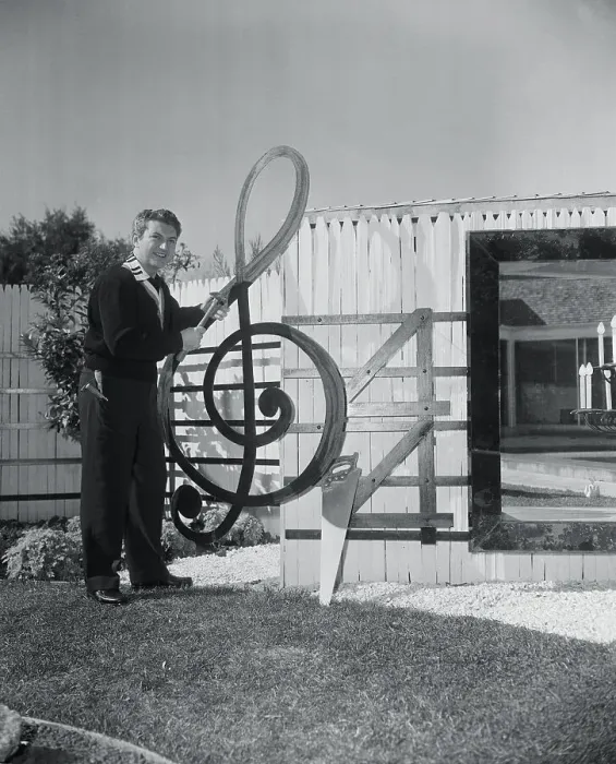 Framed Print : Liberace Standing Next to His Musical Fence Framed Print : Liberace Standing Next to His Musical Fence