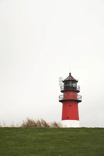 Lighthouse in the North Sea resort of Buesum, Busum, Dithmarschen, Schleswig-Holstein, Germany
