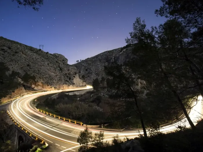 Framed Print : Lights of vehicles circulating along a road with curves during the night Framed Print : Lights of vehicles circulating along a road with curves during the night